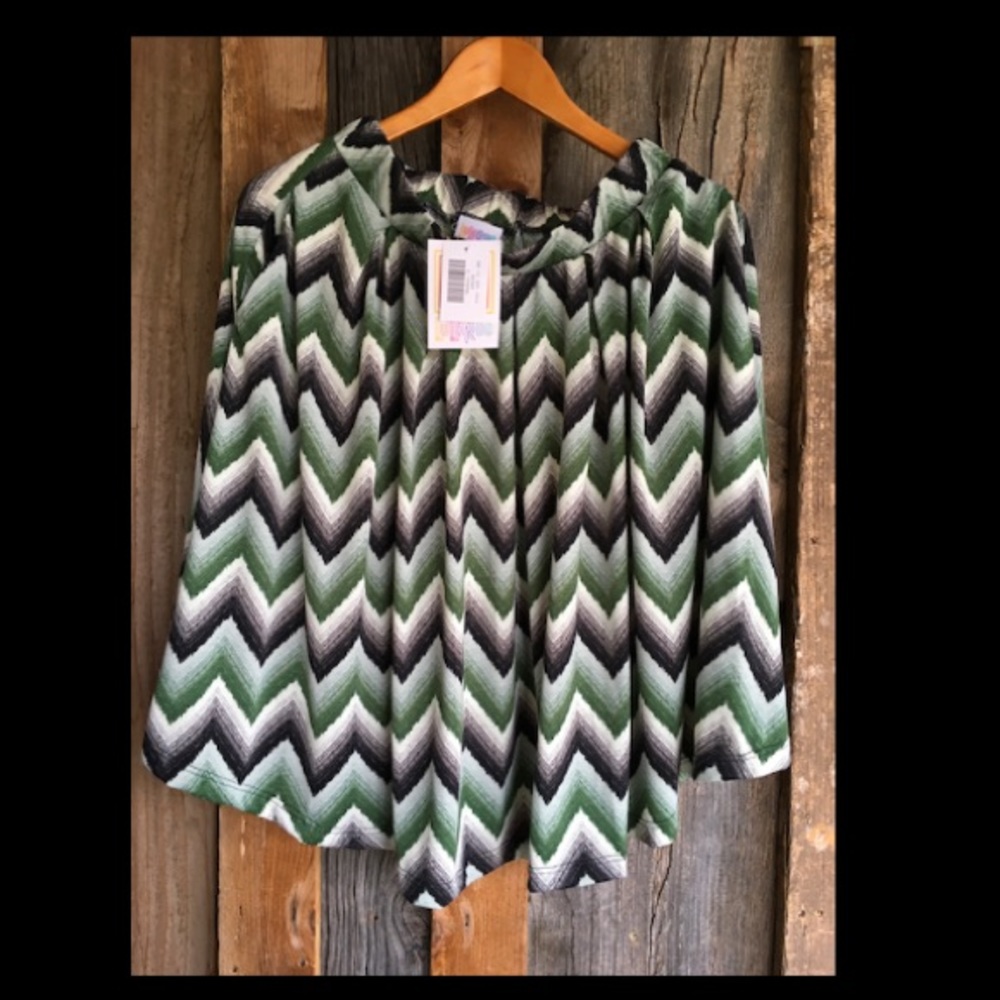 LULAROE Playful, stylish and radiant. A must have in every closet!